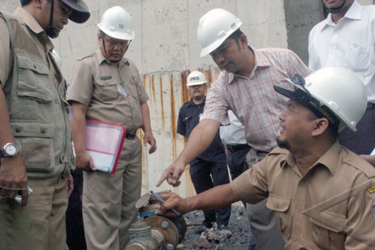 Lubangi tanah resapan air