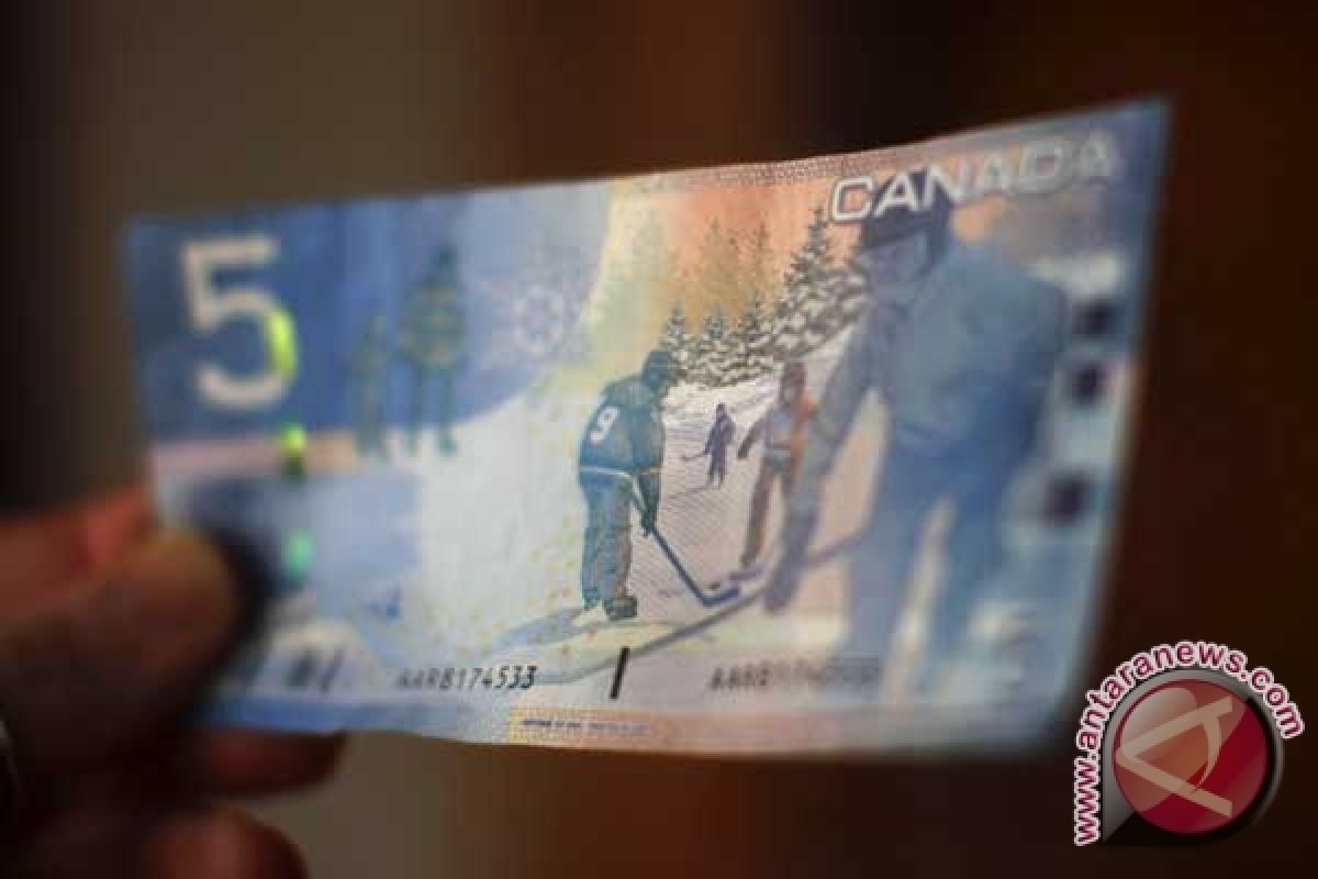 Dolar Kanada stabil dekat level terendah 2-bulan karena risiko Omicron