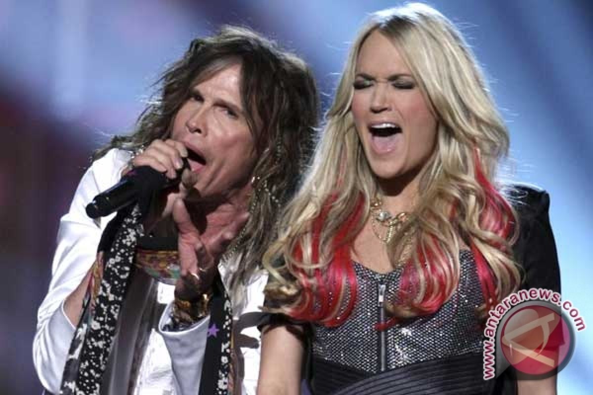 Carrie Underwood hamil anak pertama