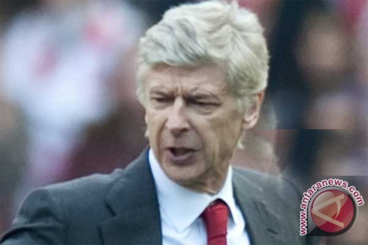 Perburuan gelar bagi Wenger belum berakhir