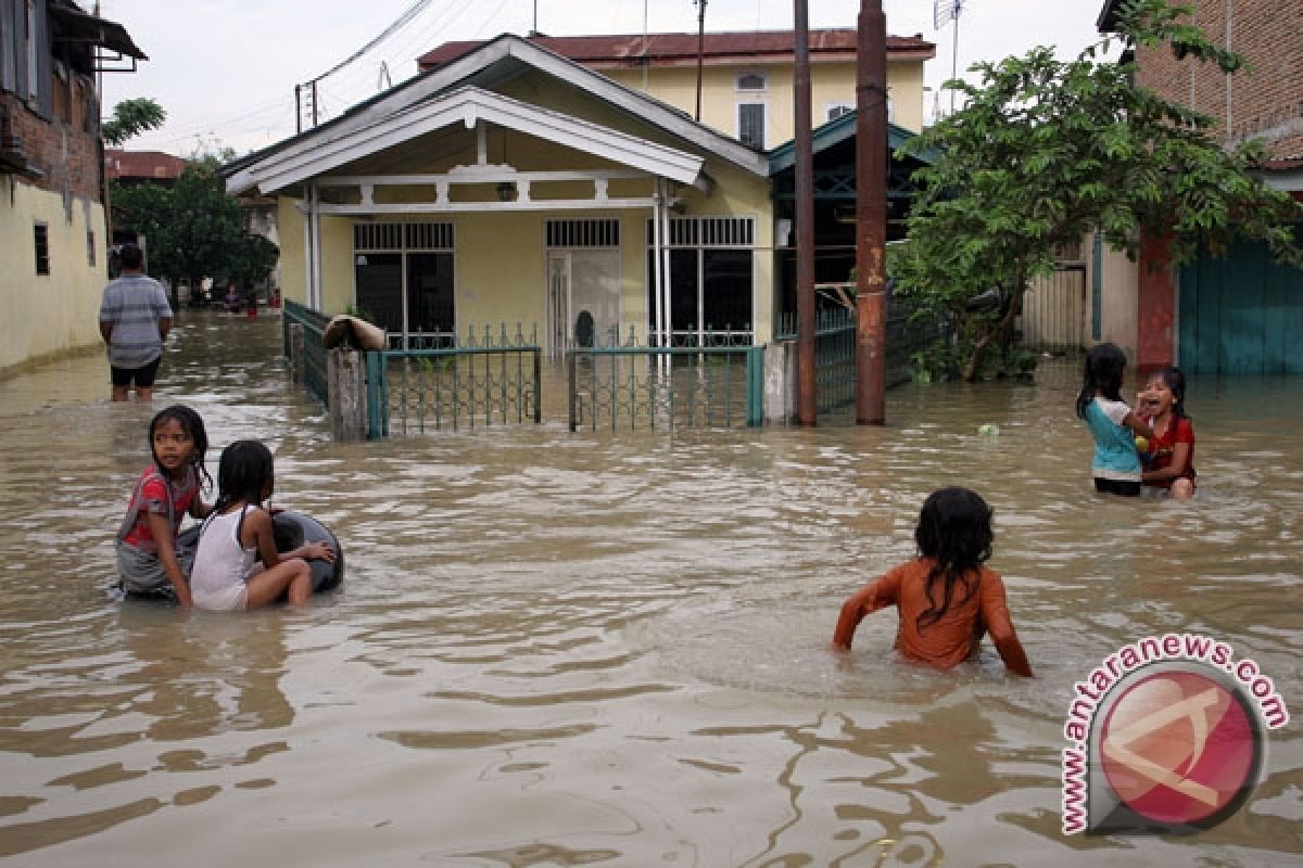 Flood inundates Medan Maimun in North Sumatra