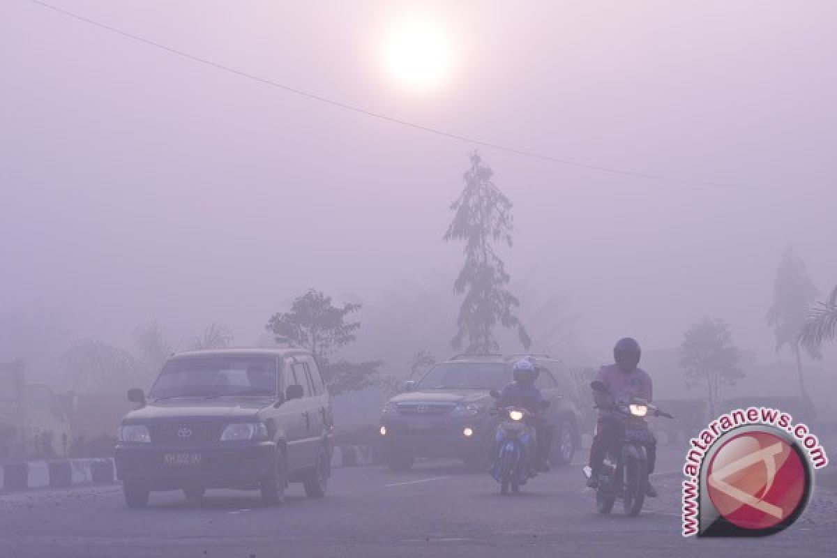 Ribuan warga Palembang sakit akibat kabut asap 