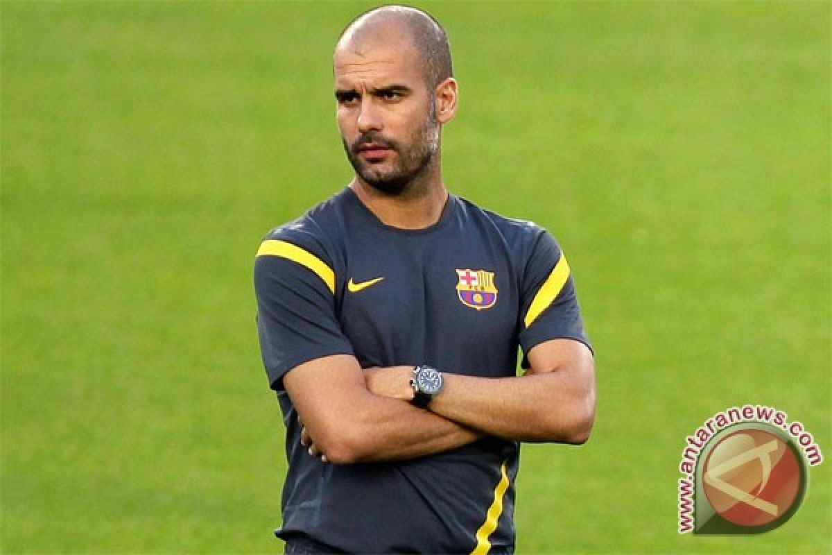 Hati Guardiola berbunga-bunga