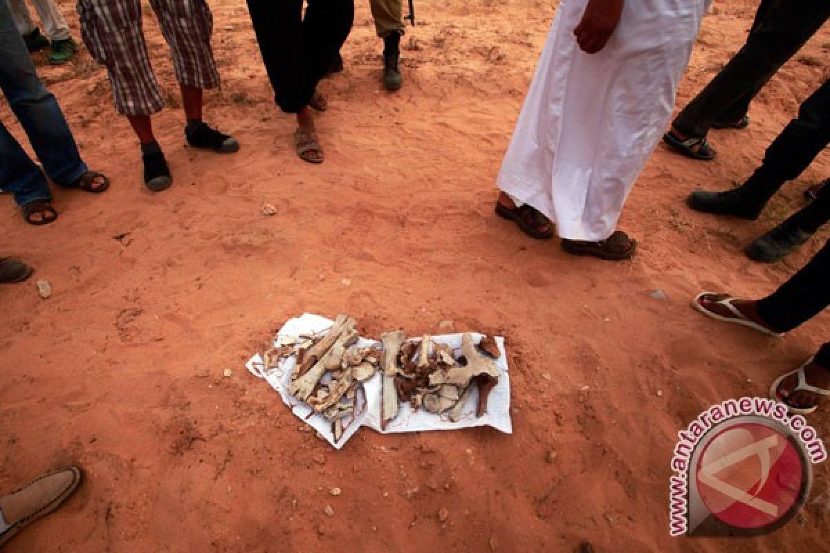 Libya`s new rulers unveil two new mass graves