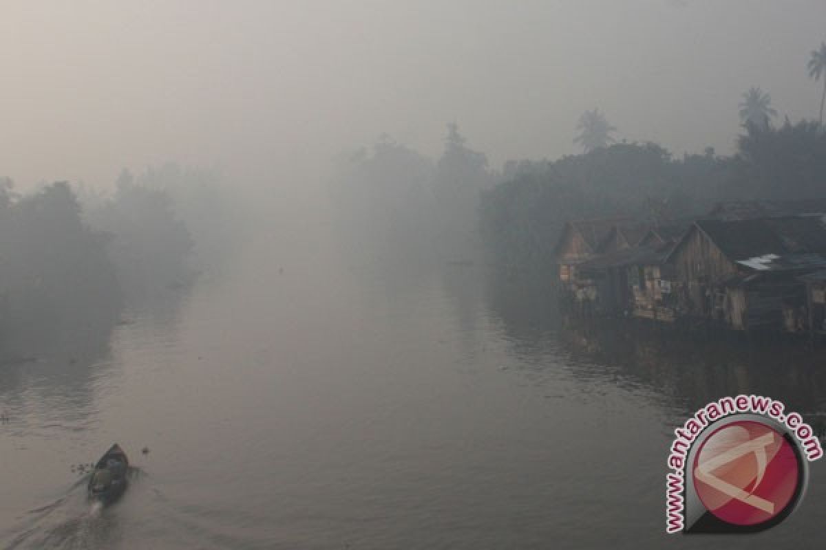 Kabut asap di  beberapa kabupaten  makin pekat