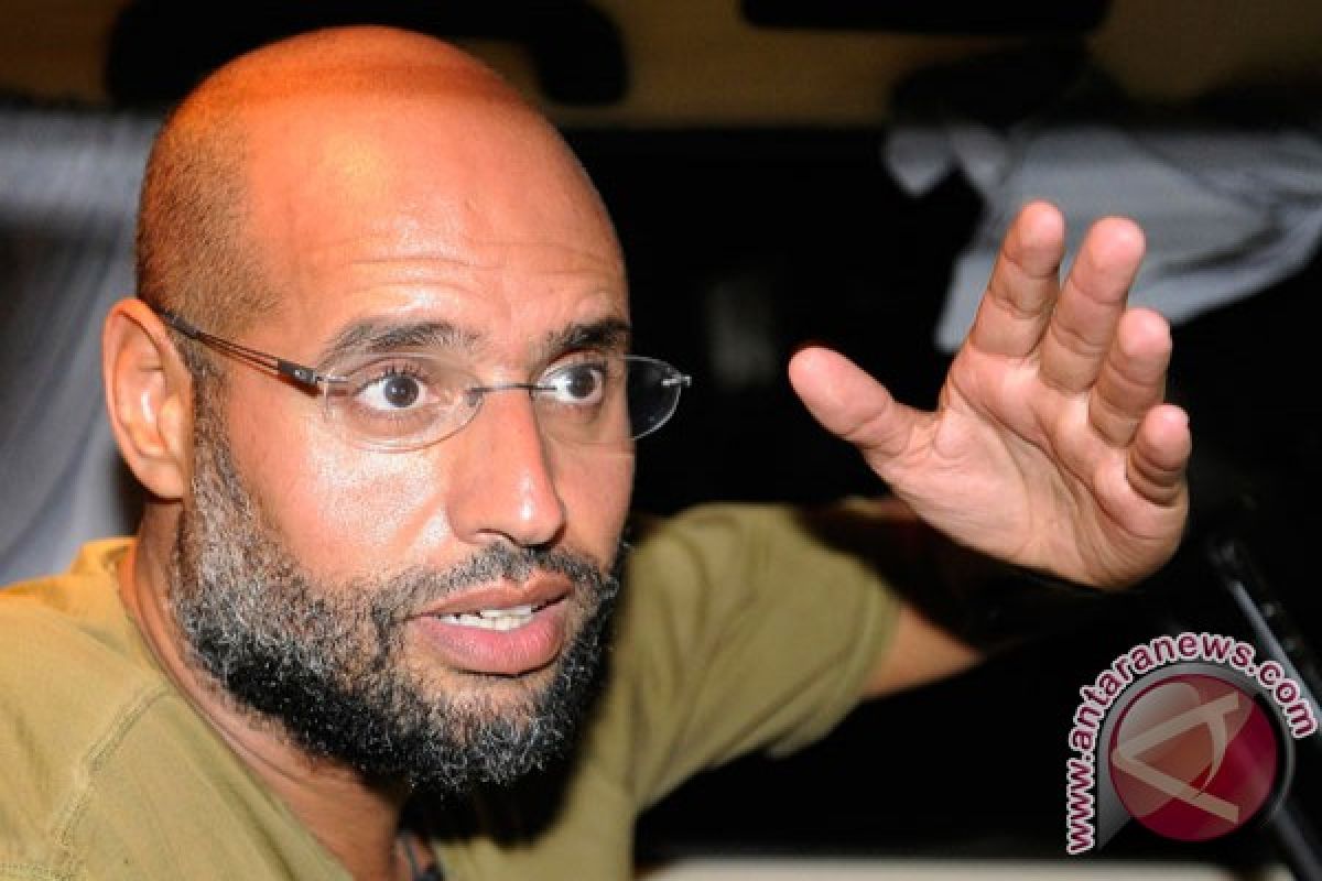 Libya confirms Gaddafi son`s trial in February