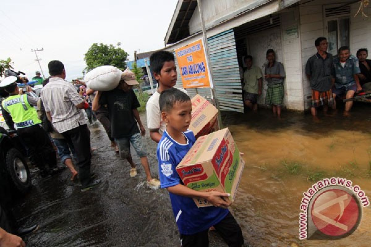 Flood forces thousands to evacuate in S Kalimantan