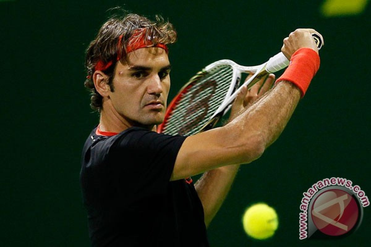 Federer melaju ke babak dua Wimbledon