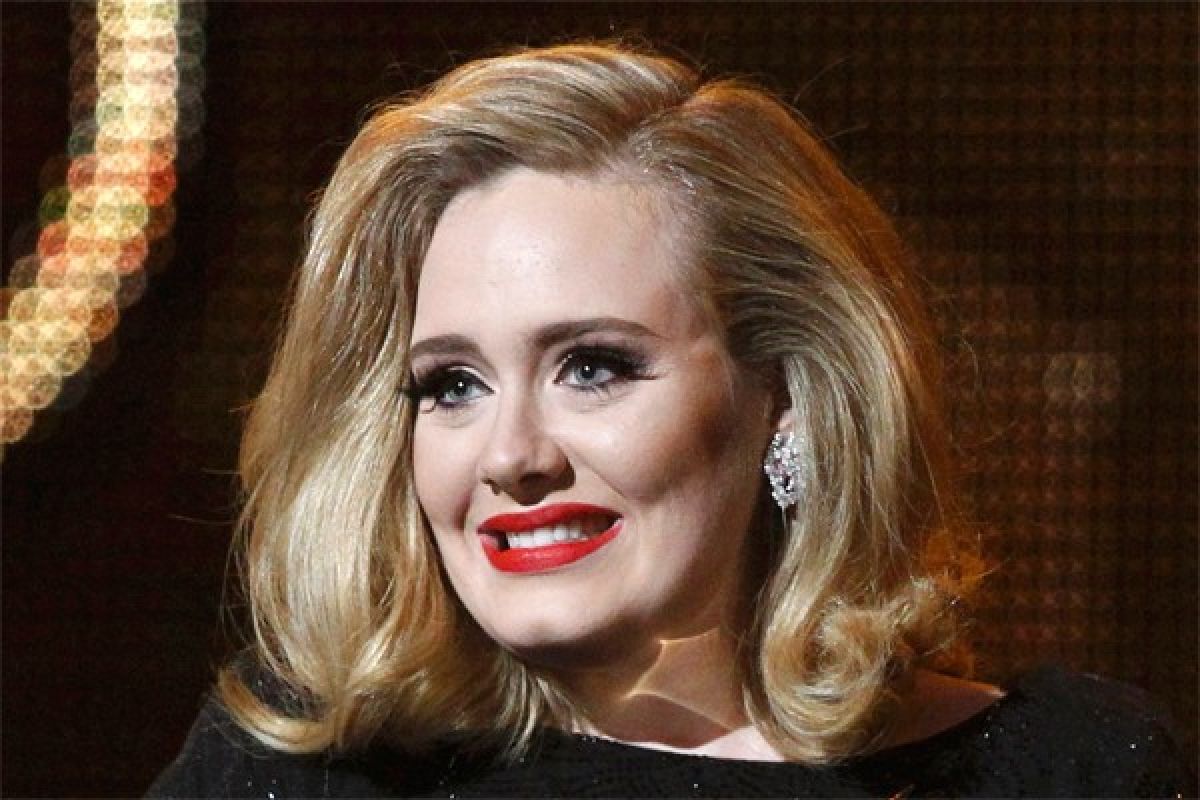 Adele lends sultry voice to bond theme for "skyfall"