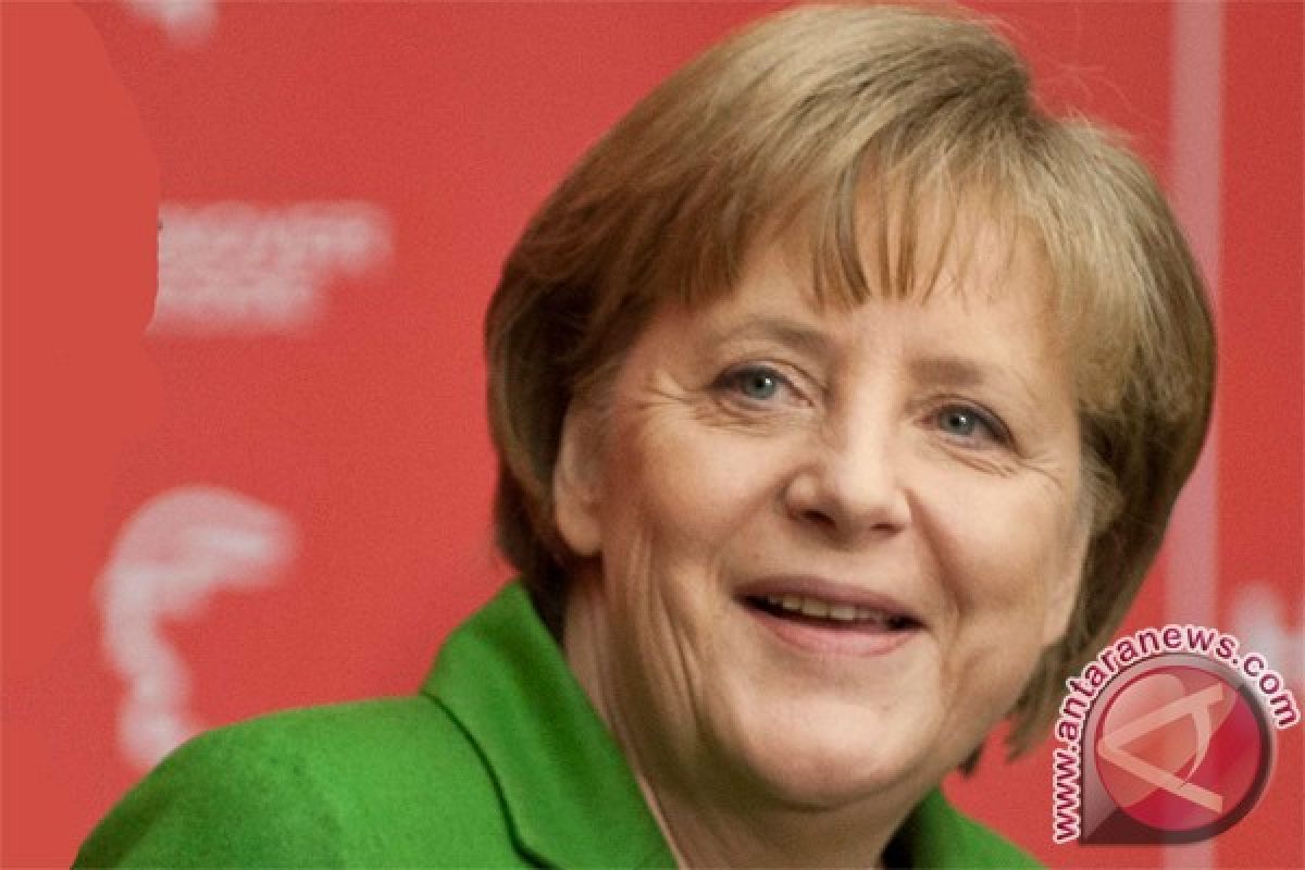Merkel asks about atheism in Indonesia