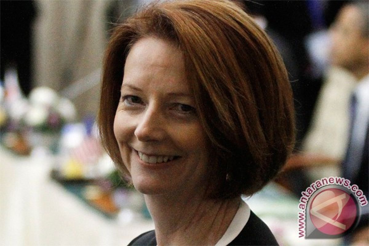 Australian PM Gillard reshuffles cabinet ahead of poll