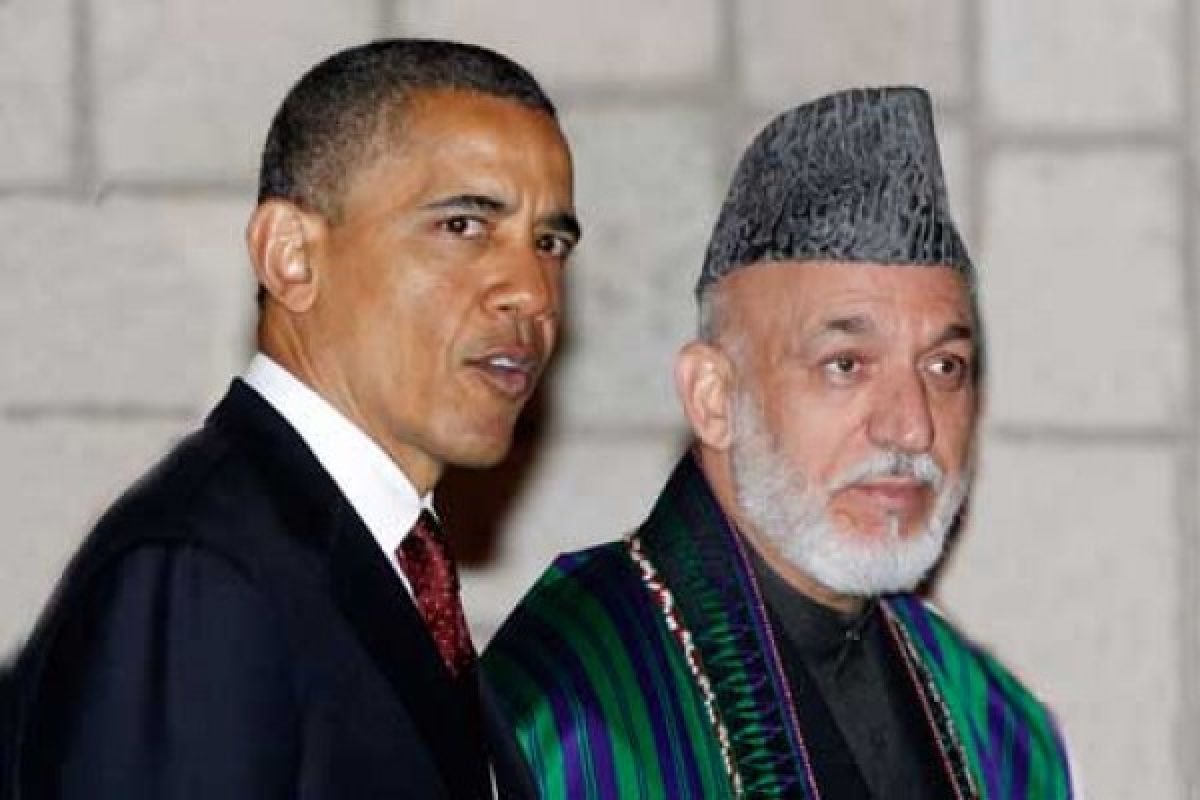 Obama, Karzai meet, Afghan peace effort show flickers of life
