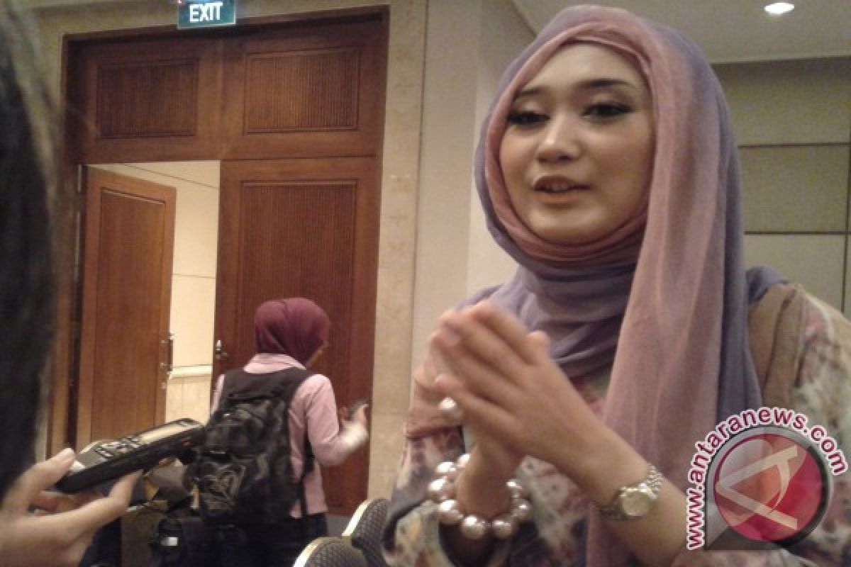 Dian Pelangi tinggalkan batik jumputan