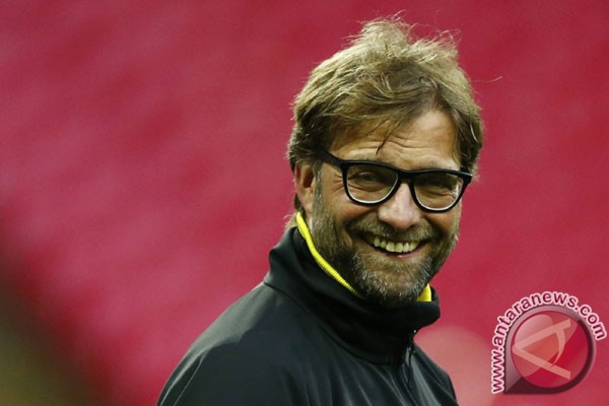 Klopp memilih sikap rendah hati