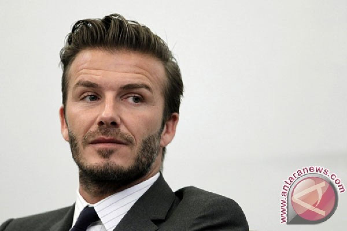 Lima orang terluka saat berebut melihat Beckham