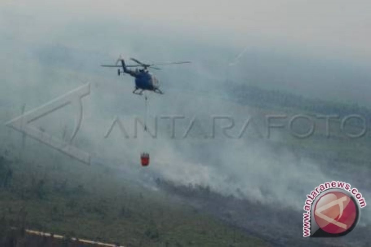 BNPB terjunkan heli atasi kabut asap di Sumsel       