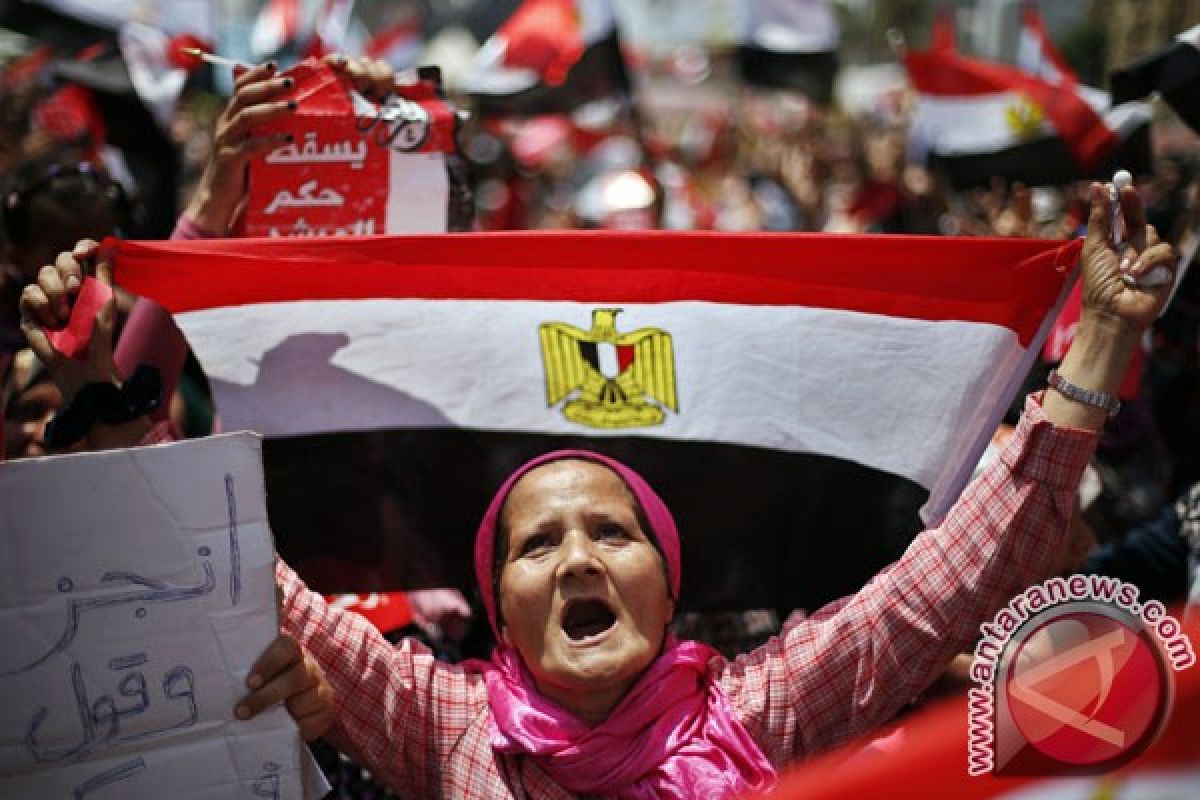 Egyptians throng streets in support of army-backed revolt