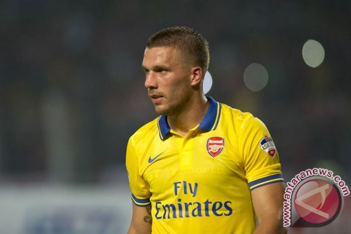 Wenger: Podolski absen tiga pekan