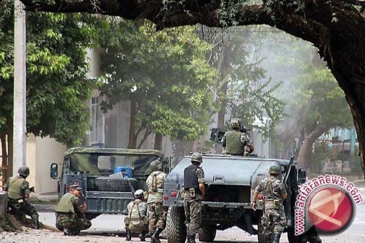 12 jasad pria luka tembak ditemukan di sebuah truk curian