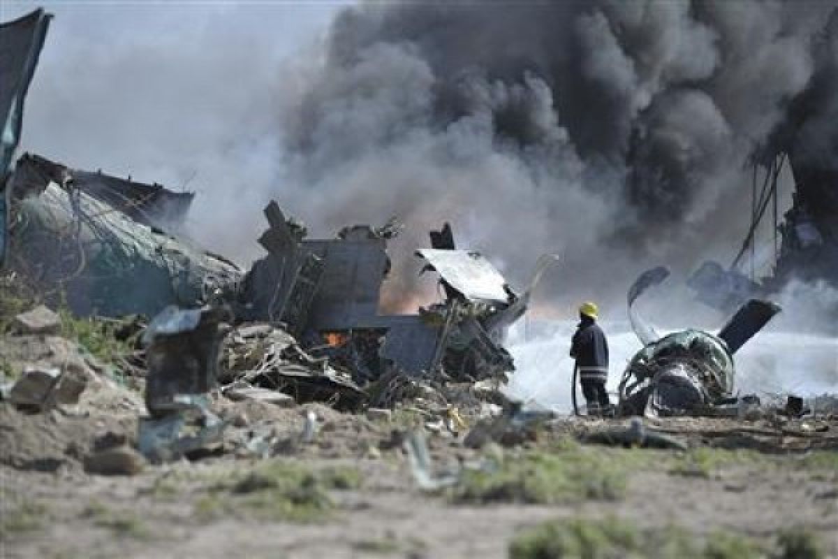 Military plane burts into flames at Mogadishu airport