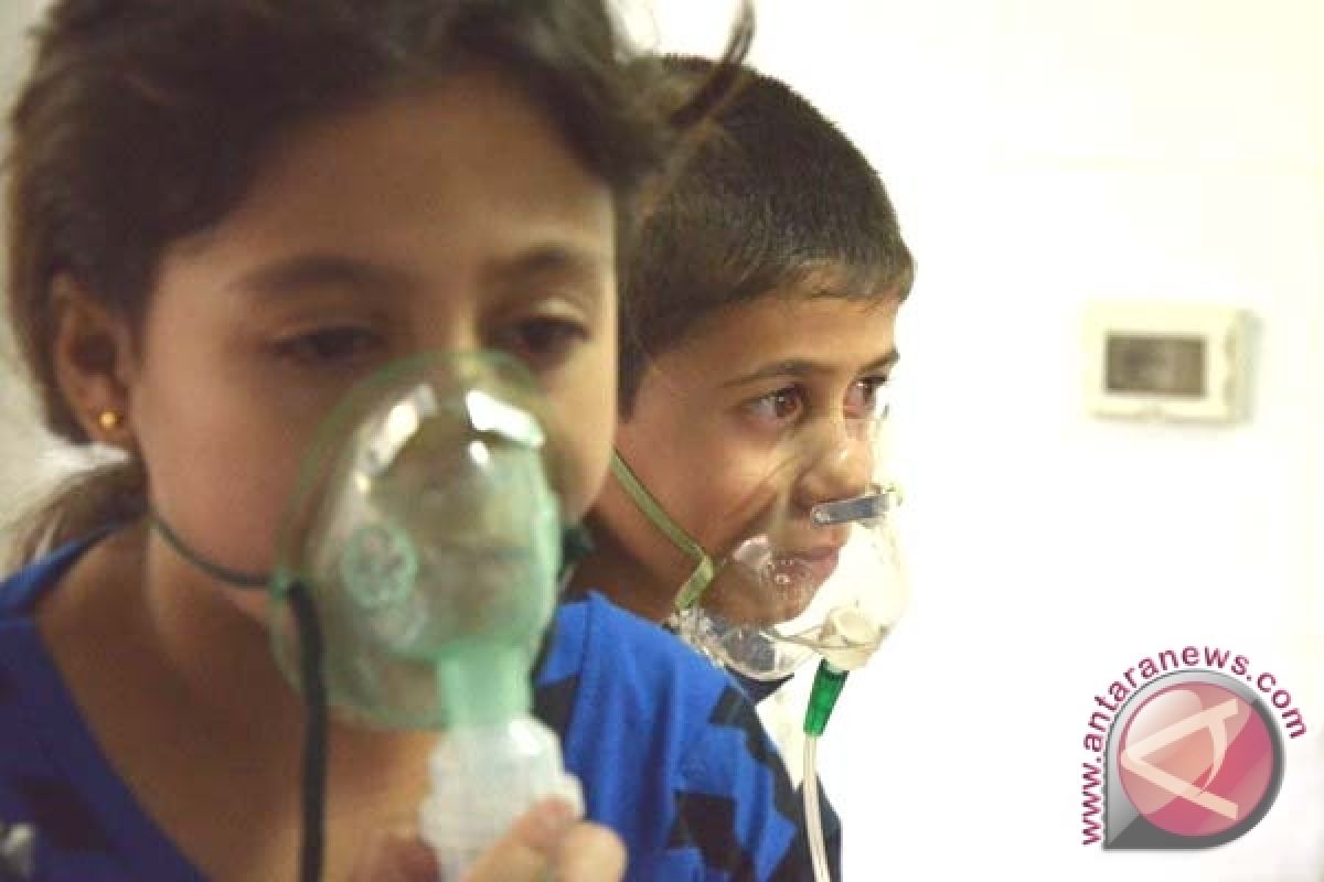 Media pemerintah Suriah: gerilyawan tembaki desa dengan gas