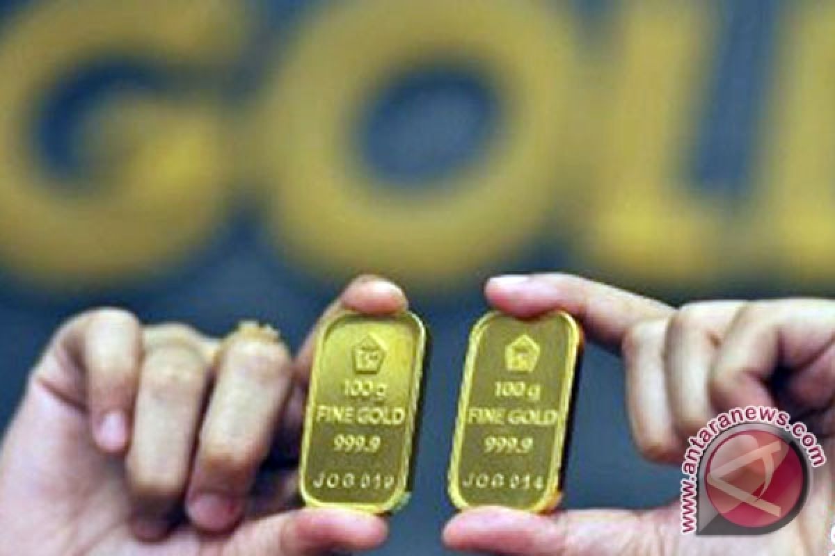 Emas turun jelang pidato para pejabat Fed AS 