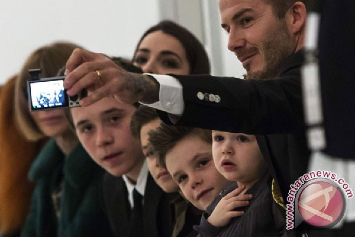 David Beckham and son unhurt in UK car crash