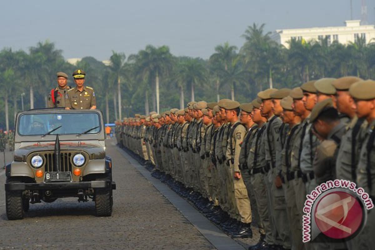 Setahun terakhir ini Satpol PP tak pakai pentungan