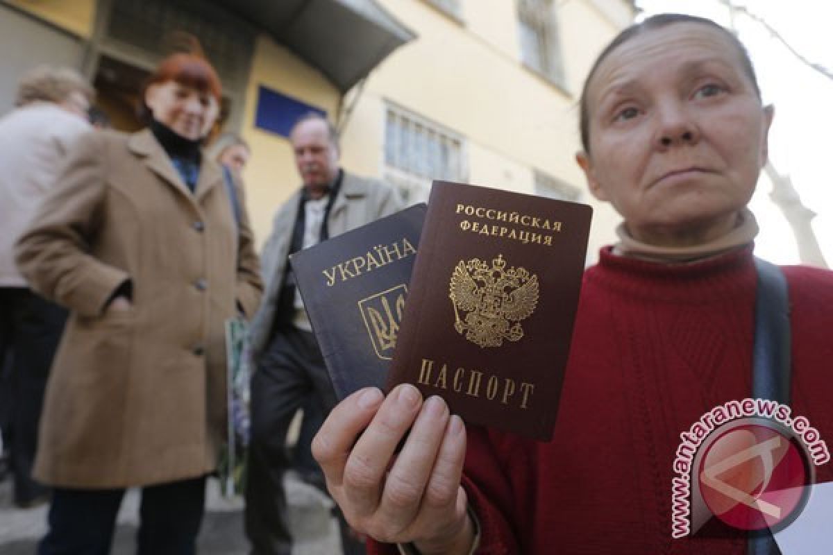 Putin: Tak ada yang salah dengan pemberian paspor