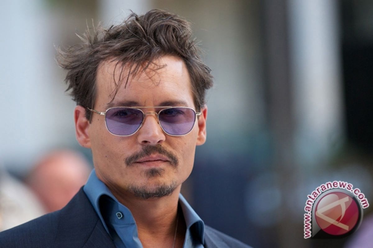 Johnny Depp bertunangan dengan Amber Heard 