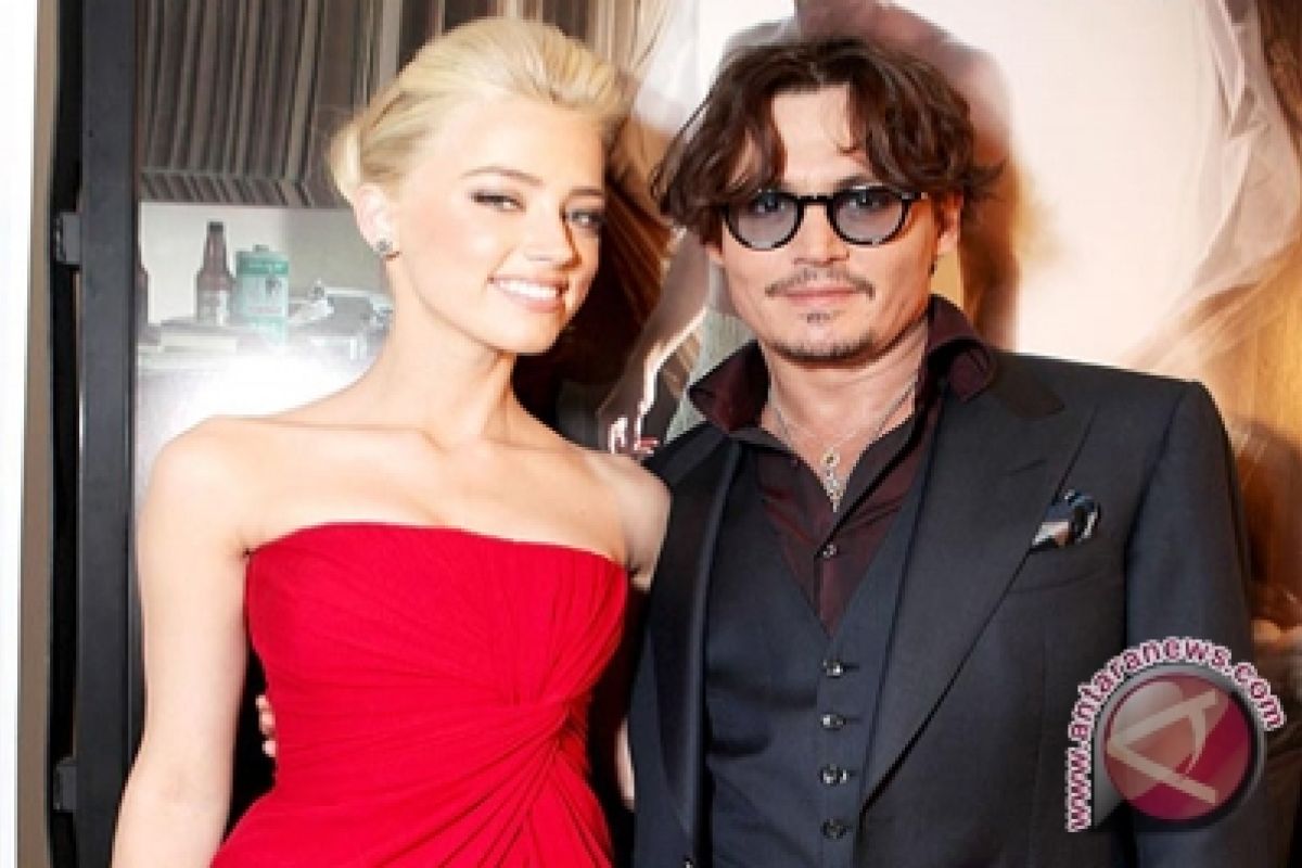 Johnny Depp Bertungan Dengan Amber Heard