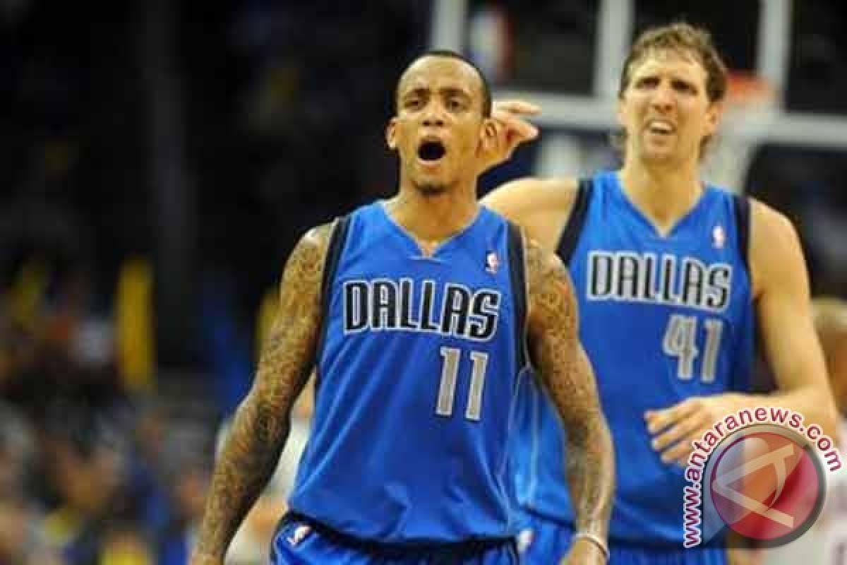 Mavericks perdalam luka Magic