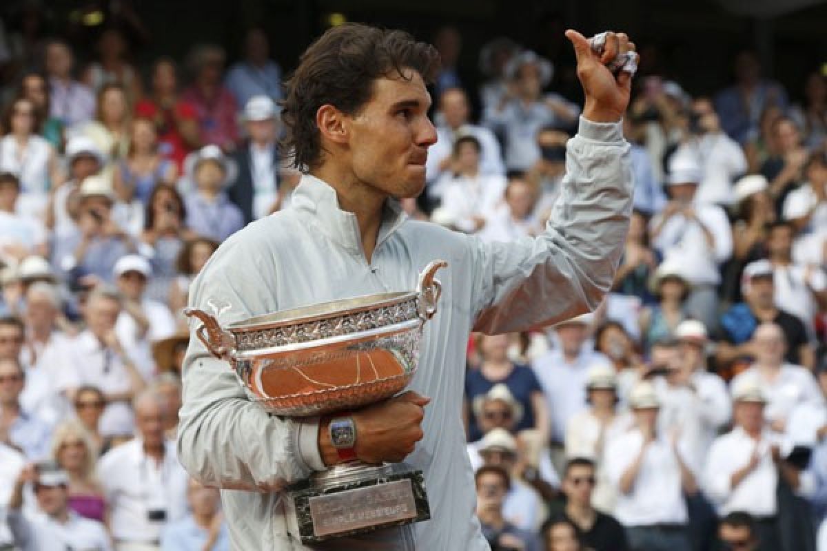 Nadal kembali ke lapangan rumput setelah menang di Paris