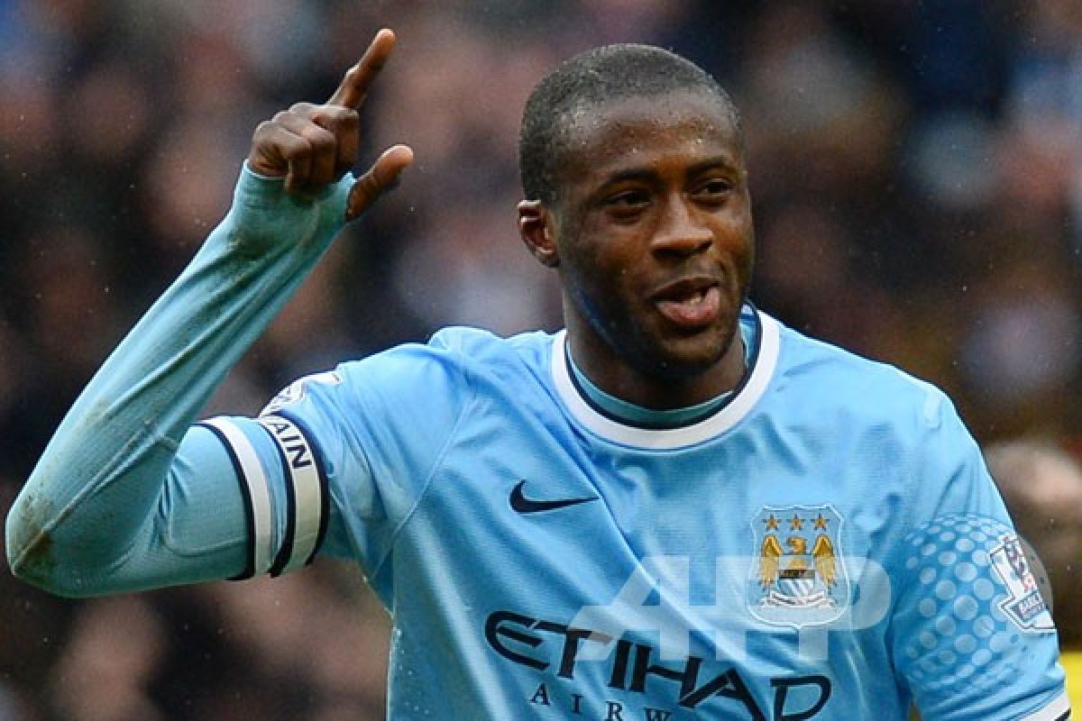 Toure bertahan di City