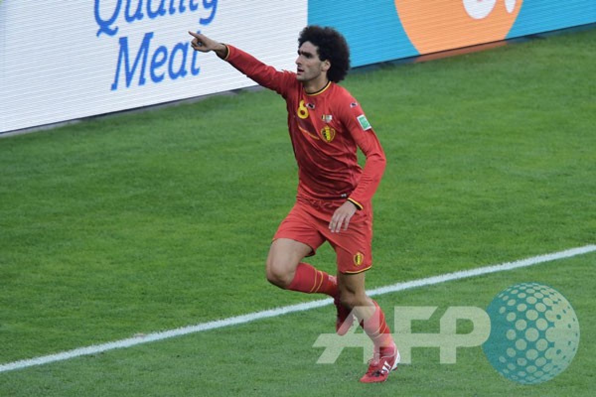 Fellaini siap pangkas rambut jika Belgia juara