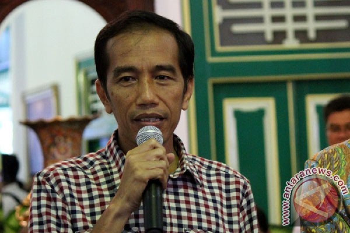 Kampanye Pertama  Jokowi--JK Diawali dengan Doa dan Tumpengan