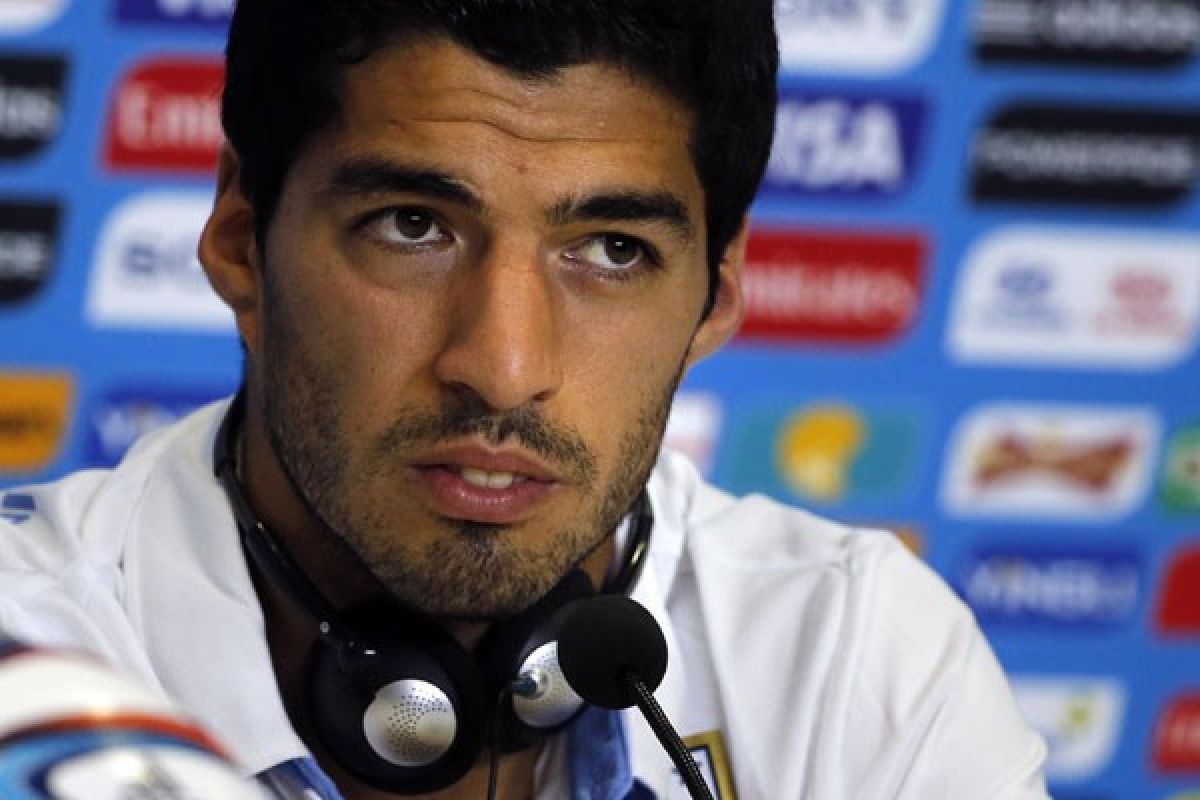 Barcelona bicarakan Suarez dengan Liverpool