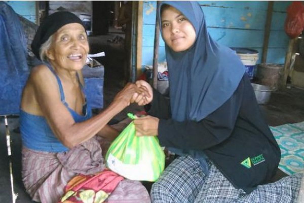 Relawan SGI Dompet Dhuafa Berbagi Bersama Warga Kubu Raya