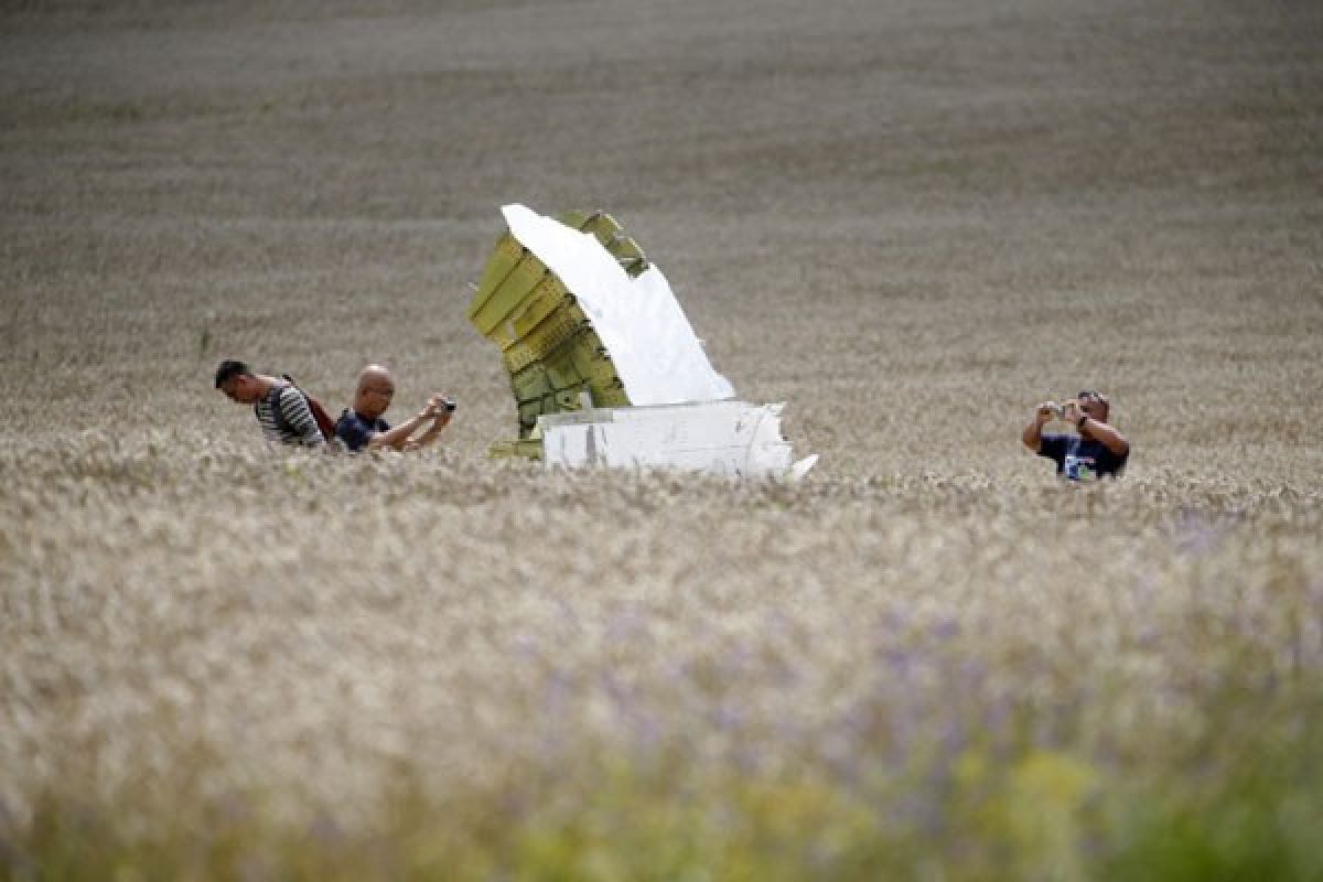 Potongan Tubuh Korban MH17 Ditemukan