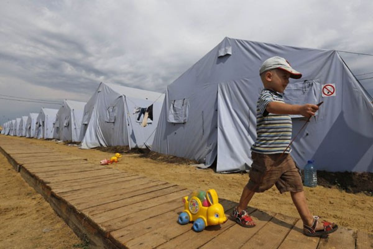 Konflik paksa 100.000 lebih orang Ukraina mengungsi