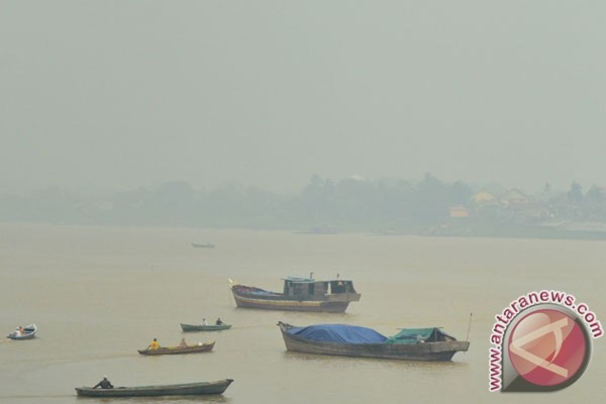 Hujan di Jambi tidak hilangkan kabut asap