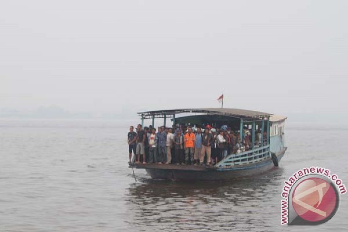 Puncak arus balik melalui Sungai Barito Minggu