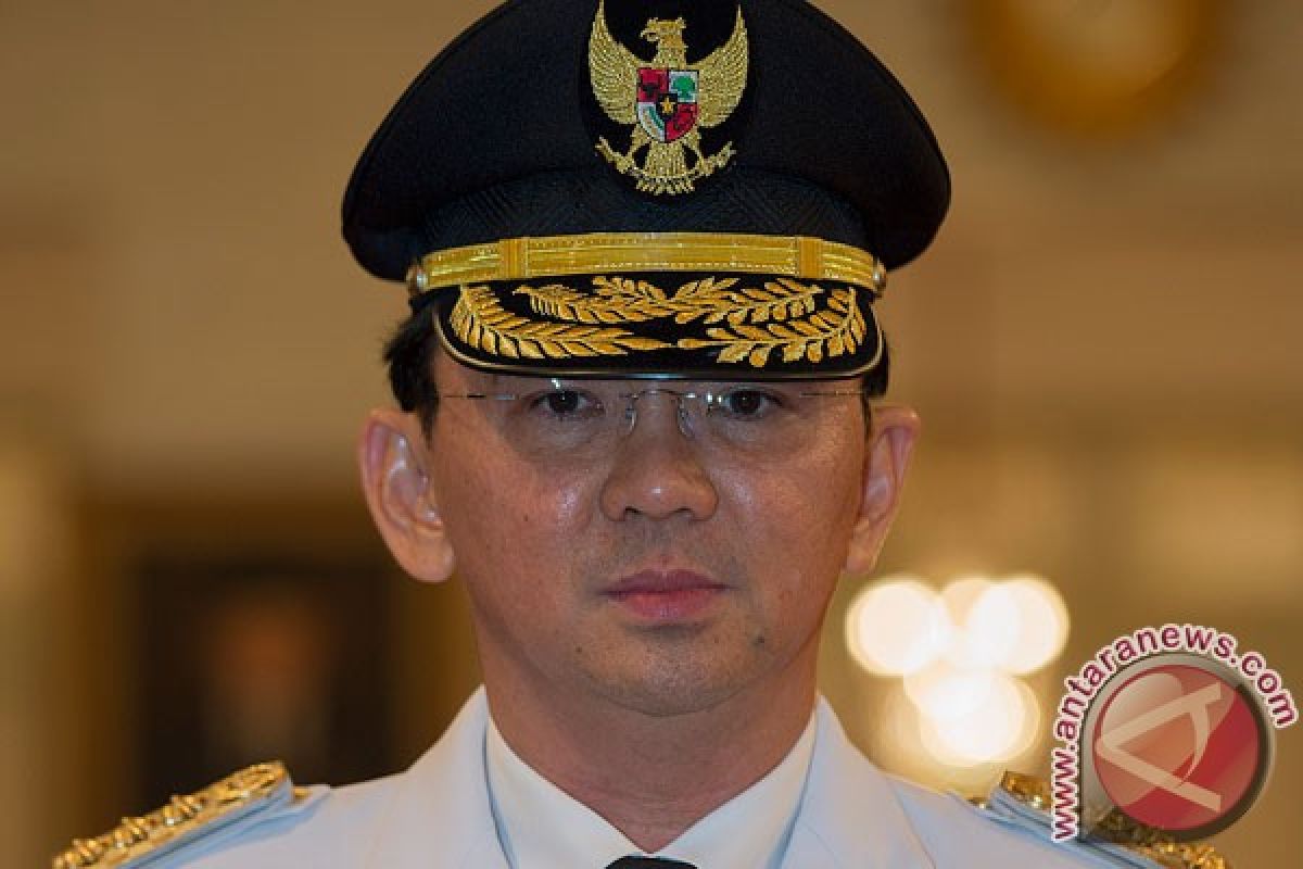 Jakarta governor threatens to fireW. Jakarta mayor during meeting