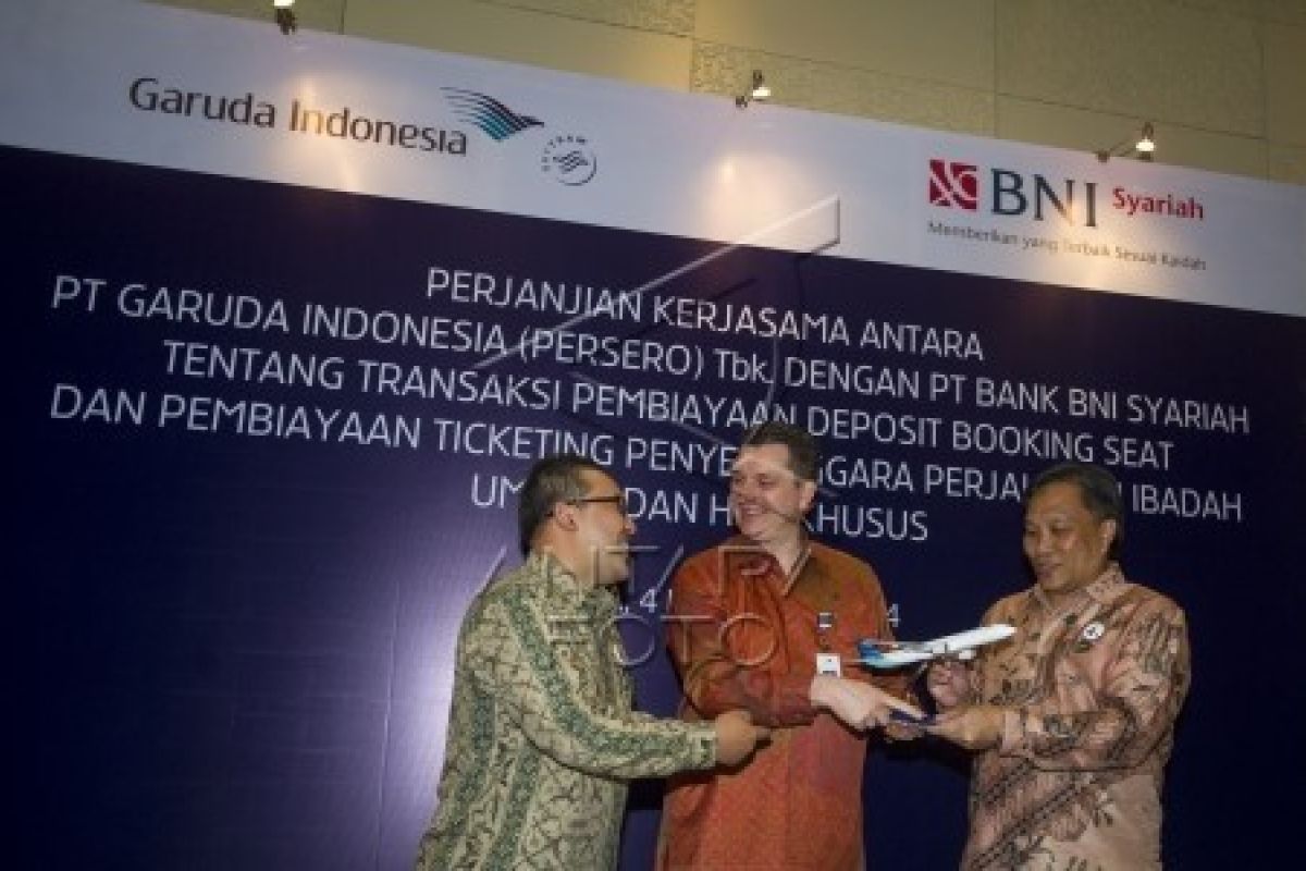 Garuda-BNI Kerja Sama Pembiayaan Tiket Haji-Umroh