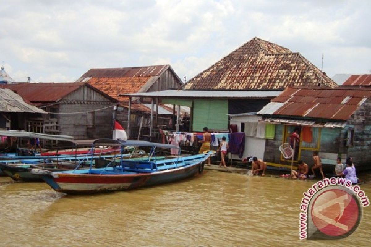 Kisah sanitasi di tepi Sungai Musi  