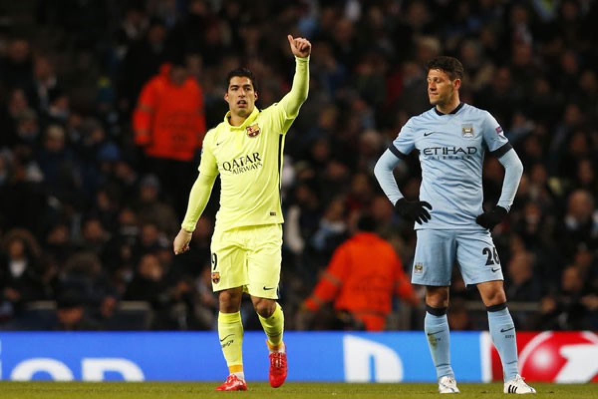 Dwigol Suarez bawa Barcelona kalahkan City 2-1