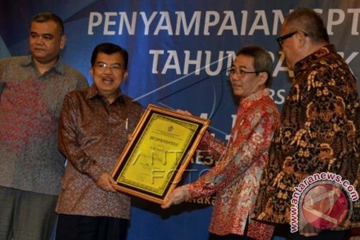 Wapres Serahkan SPT Tahun Pajak 2014