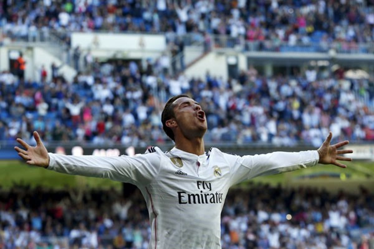 Lima gol Ronaldo antar Madrid ganyang Granada 9-1