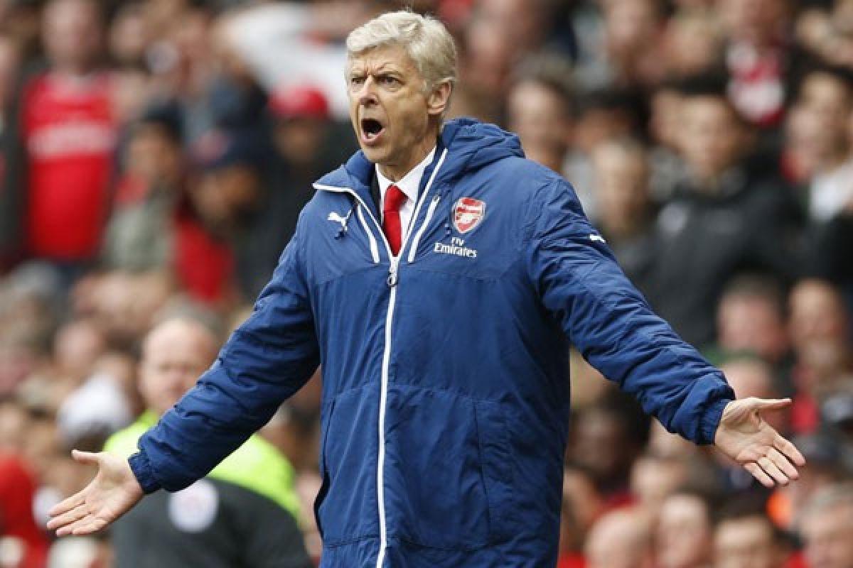 Wenger: Arsenal harus "bertarung seperti orang gila"