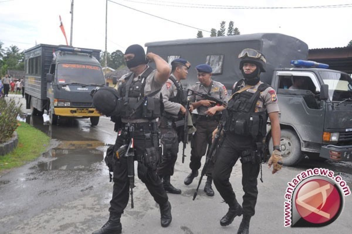 Polisi Limpahkan Berkas Sepuluh Warga Papua Bersenjata